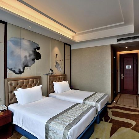 Yiwu Zhong Lian Kai Xin Hotel Exterior foto